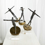 Man Finding Balance Sculpture