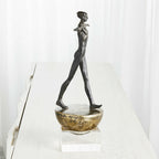Man Finding Balance Sculpture