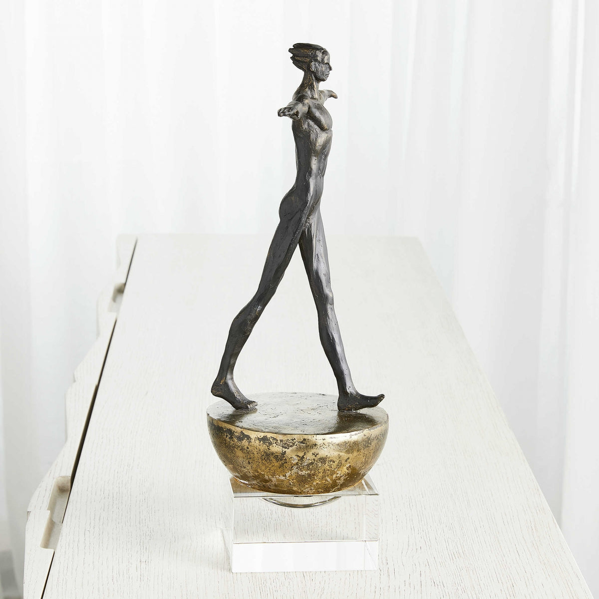 Man Finding Balance Sculpture